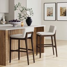 two stools in front of a kitchen island