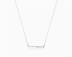 14K White Gold Bar Diamond Necklace. This minimal gold and diamond bar necklace is the perfect gift for those looking for an elegant, modern look. The polished gold is offset with three dazzling diamonds delivering the perfect amount of sparkle on an 18 inch chain. aka Diamond Necklaces Minimalist Diamond Necklace With Cable Chain, Minimalist White Gold Bar Necklace For Anniversary, Refined White Gold Diamond Cut Necklaces, Classic Diamond Accents Bar Necklace For Anniversary, Minimalist Diamond Accents Bar Necklace As Gift, Minimalist Diamond Bar Necklace With Single Cut Diamonds, Minimalist Bar Necklace With Single Cut Diamonds, Minimalist Diamond Accents Bar Necklace Gift, Minimalist Bar Necklace With Diamond Accents For Gift