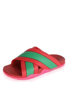 Gucci slides feature the iconic green and red Web detail, paired with a contrasting pink sole. The open toe design ensures breathability and comfort. The moulded footbed provides support for all-day comfort. Crisscross straps add a unique touch to the design. An embossed Gucci logo highlights the brand's craftsmanship. The branded insole adds a final signature touch to these luxury slides.Composition: Rubber 100%Sole: Rubber 100%Made in Italy Have Questions about us, read our FAQ Chevron Outfit, Chevron Jewelry, Gucci Slides, Web Detail, Gucci Shop, Red Web, International Clothing, Shoes Flats Sandals, Luxury Women Fashion