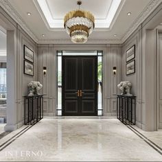 an elegant entry way with chandelier and marble flooring in the middle of it