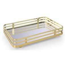 a gold metal tray with handles