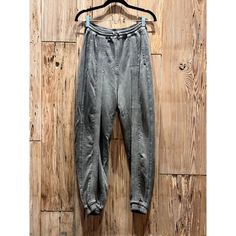 Roque Women's Super Comfy Joggers / 4 / Grey / Made In Italy Size - 4 Color - Great Never Worn Made In Italy Features: Italian Design Size: Womens 4 Condition: Pre-Owned Like New Athleisure Washed Loungewear Bottoms, Washed Athleisure Bottoms For Loungewear, Sporty Relaxed Fit Washed Bottoms, Floral Joggers, Drawstring Jogger, Rayon Pants, Printed Joggers, Grey Joggers, Pleated Shorts