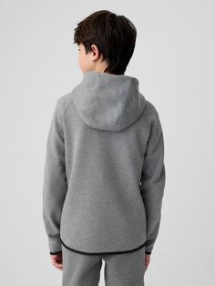 GapFit Kids Fit Tech Hoodie | Gap Sporty Gap Sweatshirt With Adjustable Hood, Gap Sporty Fleece Sweatshirt, Sporty Hooded Sweatshirt By Gap, Sporty Hooded Gap Sweatshirt, Gap Hoodie With Drawstring Hood, Gap Fleece Hoodie With Adjustable Hood, Sporty Recycled Polyester Hoodie For Winter, Gap Outerwear With Drawstring Hood, Gap Outerwear With Drawstring Hood And Long Sleeves