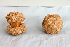 two peanut butter and oatmeal cookies sitting on top of each other