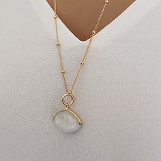 Long Moonstone Gold Necklace for layering 14k Gold Filled Satellite chain - Jewelry gift ideas for wife, mom, bride, bridesmaids, girlfriend Gemstone: Genuine Moonstone Pendant Size: 20x15mm Bezel: Vermeil Gold Chain: Satellite Chain: 14K Gold Filled with spring ring clasp Chain: 1mm Length: 24 inches About "Gold Filled Jewelry": Also called rolled-gold. These jewelry items are not actually filled with gold. They are made of a base metal covered by sheets of gold in a mechanical bonding process. Gold Moonstone Round Jewelry, Delicate Moonstone Round Pendant Necklace, Delicate Round Moonstone Pendant Necklace, Delicate Moon Charm Necklace For Wedding, Dainty Moon Phase Necklaces For Wedding, Dainty Moon Phase Necklace For Wedding, Delicate Wedding Necklaces With Moon Charm, Delicate Wedding Necklace With Moon Charm, Gold Moonstone Pendant Necklace