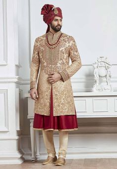 Gold Sherwani With Zari Work For Designer Wear, Gold Kurta With Pallu For Reception, Gold Sherwani With Dupatta For Reception, Designer Gold Embroidered Sherwani, Festive Long Gold Bandhgala, Gold Sherwani With Pallu For Reception, Gold Long Traditional Wear For Reception, Gold Long Sherwani With Pallu, Gold Long Sherwani With Zari Work