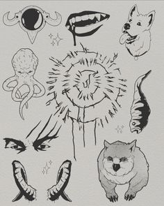 an image of various animals drawn in black and white on the paper with some ink