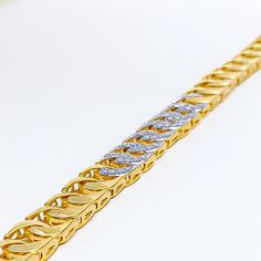 This exquisite 18k gold link bracelet, weighing 17.1 grams, features a chic design adorned with 0.78 carats of round brilliant cut diamonds. The diamonds have a color grade of F-G and a quality grade of VS, adding exceptional sparkle and elegance. The yellow gold finish enhances its luxurious appeal, making it perfect for any special occasion. The bracelet has a size of 7 inches, offering both style and comfort. This piece is openable, designed with a secure buckle lock for added convenience. Id Gold Chic, Gold Link Bracelet, Gold Link, Round Brilliant Cut Diamond, Brilliant Cut Diamond, Chic Design, Round Brilliant, Link Bracelets, Gold Finish