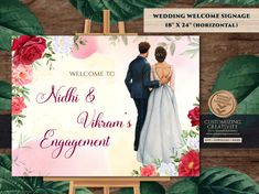 a wedding welcome sign with an image of a couple on it and the words,'welcome to nishi & akhria's nirvana's engagement '