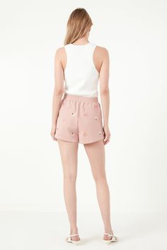 Get ready to show off your summer style with these Floral Embroidered Shorts. Crafted with a floral embroidered design, elastic inserted waist, pockets and a short length, these shorts are perfect for showing off your summer look. Whether beachy or city chic, these shorts will have you looking and feeling great all season long. Floral embroidered Elastic inserted waist Short length Pockets Hand wash cold Do not bleach Do not tumble dry Iron low Shell: 100% Cotton Exclusive of Elastic Exclusive o Feminine Cotton Shorts For Day Out, Feminine Cotton Shorts, Trendy Summer Shorts With Side Pockets, Feminine Summer Cotton Bottoms, Feminine Cotton Beach Shorts, Feminine Cotton Short Bottoms, Feminine Short Cotton Bottoms, Pink Cotton Shorts For Day Out, Chic Pink Cotton Shorts