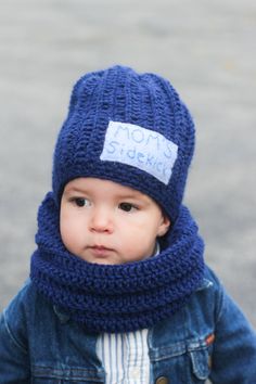 No longer taking Christmas orders, all orders will ship in the new year! This adorable Mom's sidekick hat and Cowl scarf set would be perfect for your little boy. Available in size infant to Kids. Writing on the felt is hand stitched and then the felt is stitched on the hat. Made in a smoke free home Made with 100% acrylic yarn Peppa Pig Halloween Costume, Pig Halloween Costume, Superhero Hats, Pig Halloween, Blue Popcorn, Boys Winter Hats, Baby Boy Hat, Girls Winter Hats, Christmas Beanie