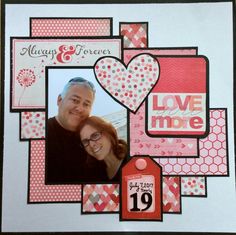 a couple is posing for a picture in front of a valentine's day card