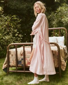 Spend a morning in the garden in The Sleep Robe. Crafted from the softest 100% cotton, printed in soft stripes, this loungewear staple has a roomy fit, delicate contrast piping around the neckband and sleeves, the perfect low-calf length, and a secure waist tie. Its voluminous wide sleeves make this dreamy piece extra special. 100% Cotton Machine Wash Cold, Lay Flat to Dry Import Spring Sleepwear With Relaxed Fit, Spring Cotton Sleepwear For Home, Comfortable Spring Sleepwear, Spring Sleepwear With Relaxed Fit For Bedtime, Relaxed Fit Sleepwear For Spring Bedtime, Relaxed Fit Spring Sleepwear For Bedtime, Pink Cotton Nightgown For Lounging, Comfortable Cotton Nightgown For Spring, Comfortable Relaxed Fit Sleepwear For Spring