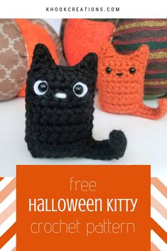 a crocheted halloween kitty sitting next to two pumpkins with eyes on them