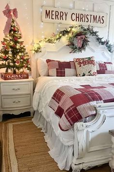 a bedroom decorated for christmas with red and white bedding, plaid pillows and blankets