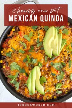 a skillet filled with mexican quisadilla and topped with avocado