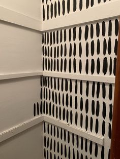 the wall is painted with black and white paint