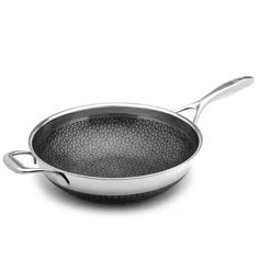 an empty frying pan on a white background