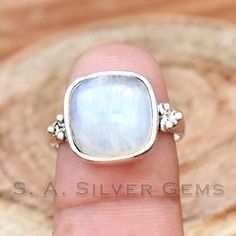 Moonstone - Sterling Silver 925 - Handmade - Gemstone - Statement - Everyday - Square stone - Hippie -Bohemian-June Birthstone *Main Stone : Moonstone *Main Stone Color : White *Main Stone Creation : Natural Gemstone *Metal : Sterling Silver *Base Metal : 925 parts per 1000 *Style : Ring ✈ Free Shipping in the USA (USPS) What Are The Benefits of Silver Jewelry Silver has a long history in antibiotics and sterilization, with many women and men wearing silver jewelry to stave off infection, cold/flu symptoms, and any other virus, bacteria, etc. This health benefit is one of the reasons why so many manufacturers choose to make medical devices and tools out of silver. Silver also helps with internal heat regulation and circulation. Many have reported improvements in energy levels and balance i White Bohemian Jewelry With Stone Setting, Bohemian White Jewelry With Stone Setting, Bohemian Jewelry With Rectangular Gemstone, Handmade Bohemian Moonstone Gemstones, Bohemian Moonstone Jewelry For Anniversary, Bohemian Rectangular Gemstone Jewelry, Adjustable Moonstone Jewelry With Stone Setting, Silver Bohemian Moonstone Ring With Gemstone Accents, Bohemian Silver Moonstone Ring With Gemstone Accents