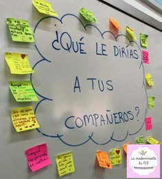 a bulletin board with sticky notes attached to it that says doue le dirais atus compauters?