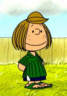 a cartoon boy in a green shirt and hat standing in the middle of a field