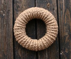 a rope ring on the side of a wooden door