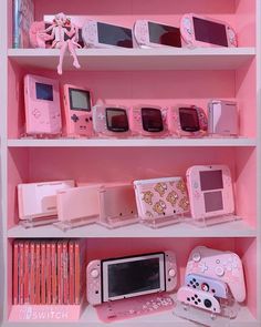 a shelf filled with lots of different types of nintendo wii game controllers and other electronic devices