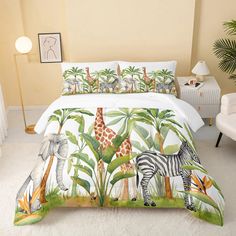 a bed with a zebra and giraffes on it