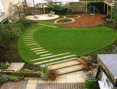 an aerial view of a small backyard with steps leading up to the back yard area