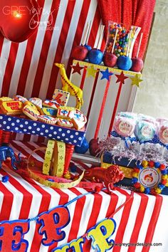 a circus themed birthday party with red, white and blue decorations