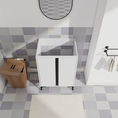 an overhead view of a bathroom with grey and white tiles on the floor, sink, mirror and towel rack