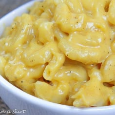 a white bowl filled with macaroni and cheese