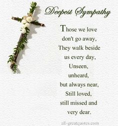 a cross that has flowers on it with the words deepest sympathy written in front of it