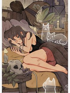 a woman laying on top of a bed next to a cat and a skull in a vase