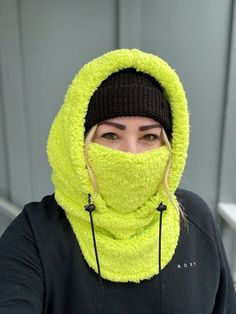 Balaclava - Sherpa FITS OVER HELMET! Fits over most adult helmets as well as over beanies  Hood made with Sherpa fleece Stay warm in style!  Wear with hood up or down, and face mask up or down  Pull strings with cord stops to stay tight  Adult size, fits most!  Beanie hat not included  100% polyester   Dry clean only!  *Pattern placement may vary Winter Sports Windproof Balaclava, Hooded Fleece-lined Balaclava For Winter, Winter Sports Balaclava With Adjustable Hood, Hooded Balaclava For Snowboarding, Windproof Hats For Outdoor Winter Wear, Warm Balaclava For Winter Outdoor Activities, Windproof Winter Hats For Outdoor, Winter Beanie For Outdoor Activities With Fleece Lining, Warm Winter Balaclava For Streetwear