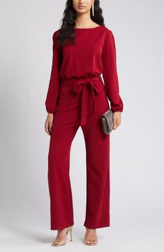 The jumpsuit trend is, well, hopping, and this option, styled with an easy tied waist and elastic cuffs, is a winning way to wear the look. Boat neck Long sleeves with elastic cuffs 60% polyester, 40% cotton Dry clean Made in the USA Chic Jumpsuits And Rompers With Belted Cuffs For Work, Chic Workwear Jumpsuits And Rompers With Belted Cuffs, Elegant Jumpsuits And Rompers With Tie Waist, Elegant Jumpsuits With Belted Cuffs, Chic Workwear Pantsuit With Tie Waist, Chic Loungewear Jumpsuits And Rompers With Elastic Waistband, Chic Jumpsuit With Elastic Waistband For Loungewear, Chic Loungewear Jumpsuits With Elastic Waistband, Chic Jumpsuits And Rompers With Elastic Waistband For Loungewear