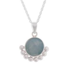 Accentuated by gleaming baubles of sterling silver a round stone of blue opal displays its hues in the pendant of this necklace from Peru. Patricia Jara designs this delightful necklace. Sterling Silver Teardrop Pendant Necklace With Stones, Opal Pendant Necklace With Large Pendant, Moonstone Necklace With Large Pendant, Elegant Opal Necklace With Large Pendant, Opal Gemstone Round Pendant Necklace, Silver Moonstone Round Necklace, Silver Birthstone Pendant Necklace, Silver Necklace With Round Gemstone, Elegant Silver Birthstone Necklace With Natural Stones