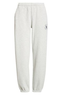 Hang out after workouts in these heathery sweatpants stamped with a monogram logo on one leg. 28" inseam; 10" leg opening; 11" front rise; 15" back rise (size X-Small) Elastic waist Side-seam pockets 97% cotton, 3% polyester Machine wash, tumble dry Made in the USA Asian & Pacific Islander Owned/Founded Athleisure Sweatpants With Logo Detail For Streetwear, Casual Jogging Sweatpants With Logo, Relaxed Fit Joggers With Logo For Loungewear, Athleisure Sweatpants With Logo For Loungewear, Athleisure Joggers With Logo Detail For Loungewear, Athletic Heather Sweats For Loungewear, Sporty Relaxed Fit Sweats With Logo Detail, Athletic Heather Athleisure Sweats For Loungewear, Sporty Sweats With Logo And Relaxed Fit