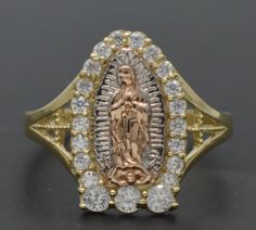 10K Real Yellow Solid Gold Virgin Mary Guadalupe cz  Ring 16mm 2.5gr ALL Sizes Celebrate faith and style with our 10K Real Yellow Solid Gold Virgin Mary Guadalupe Cubic Zirconia Ring. Crafted with precision, this ring features an intricately detailed Virgin Mary Guadalupe motif adorned with sparkling cubic zirconia stones on a 16mm band. Weighing 2.5 grams, its substantial yet comfortable weight ensures durability and lasting wear. Embrace divine elegance and spirituality with this exquisite ring, a perfect symbol of faith and devotion for any occasion. Pendant Details: Style: Band Ring Metal: 10k Gold  Metal Purity: 10k Metal stamped : 10k Polished: Shiny Weight: 2.5 Gram Gold Our Lady Of Guadalupe Ring For Anniversary, Cubic Zirconia Rings, Cz Ring, Solid Gold Rings, Multi Stone, Multi Stone Ring, Gold Design, Virgin Mary, 10k Gold