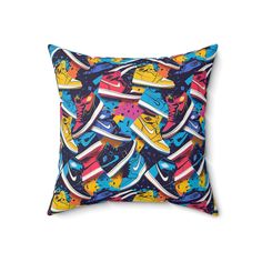 a pillow with colorful shoes on it in front of a white background and the words, nike