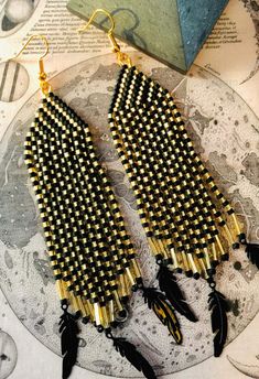 ✨handmade native style fringe earrings with metal black feathers️ Black Beaded Fringe Tassel Earrings As Gift, Elegant Black Fringe Chandelier Earrings, Black Beaded Fringe Earrings As Gift, Traditional Black Tassel Earrings, Black Fringe Jewelry For Festival, Traditional Black Jewelry With Beaded Fringe, Traditional Black Beaded Earrings With Fringe, Traditional Black Beaded Fringe Earrings, Black Tassel Jewelry For Festival