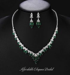 Dazzling%20Emerald%20CZ%20Wedding%20and%20Formal%20Jewelry%20Set%0D%0AComplete%20your%20elegant%20look%20with%20our%20brilliant%20emerald%20green%20CZ%20necklace%20and%20drop%20earring%20set.%20This%20glamorous%20platinum%20silver%20plated%20jewelry%20set%20features%20dazzling%205A%20quality%20clear%20and%20green%20CZ%20crystals%20in%20round%20and%20marquise%20cuts.%20This%20beautiful%20jewelry%20set%20that%20will%20add%20dazzling%20sparkle%20to%20any%20wedding%2C%20quinceanera%20or%20special%20occasion%20ensemble.%26nbsp%3B%0D%0ASize%3A%20The%20necklace%20is%20about%2015%203%2F4%22%20long%20and%20the%20pierced%20earrings%20are%20about%201%201%2F2%22%20long.%0D%0AColor%3A%20Silver%2F%20Emerald%20Green.%0D%0AStyle%3A%20ne10758E.%0D%0APlease%20allow%20about%203%20weeks%20for%20delivery.%0D%0 Beaded Edge Veil, Quinceanera Accessories, Winter Wedding Accessories, Gold Bridesmaid Jewelry, Rose Gold Tiara, Rose Gold Bridesmaid, Formal Earrings, Veil Accessories, Formal Jewelry