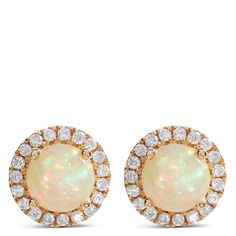 Our round cut opal stud earrings are perfect for those who appreciate the unique and complex beauty of this captivating gemstone. The halo setting adds just the right contrast while 14K yellow gold contributes the perfect dose of classic elegance. The prong set opal lets you explore all the hues and depth of the gemstones from every light-catching angle. Formal Opal Round Earrings, Formal Round Opal Earrings, Diamond Halo Earrings, Halo Diamond Earrings, Opal Stud Earrings, Halo Earrings, Opal Earrings Stud, Halo Setting, Opal Studs