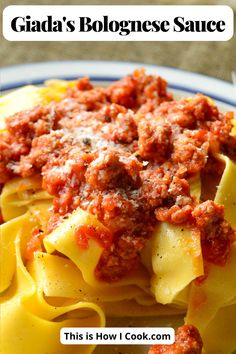 a close up of a plate of food with sauce on it and the title reads, claudia's bolognzoe sauce