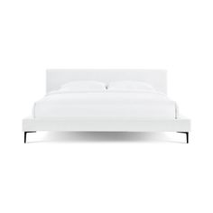 a bed with white linens and pillows on top of the headboard, in front of a white background