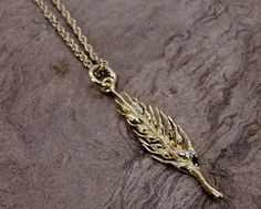 "A wheat field is so majestic and beautiful and so are the individual heads of wheat. This would make a wonderful gift for a wheat lover or wheat grower to wear. 14kt Gold vermeil Wheat Head Necklace . Great Realistic Detail. I hand sculpted the original model for this piece out of wax trying to capture all of the realistic detail I could while still making it a functional wearable design. This comes without a chain or with a 14kt gold filled 18\" long 2mm. loose rope pendant chain. Size is 1 3/ Luxury Jewelry With Wheat Chain, Luxury Gold-plated Wheat Chain Necklace, Luxury Antique Jewelry With Wheat Chain, Wheat Jewelry, Head Necklace, Wearables Design, Wheat Field, Barley, Necklace Gift