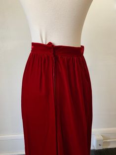 Vintage Dark Red Velvet Maxi Skirt 1970's 70's Red Velvet Gothic Full Length High Rise Skirt. In great condition! No tags on this item, but would best fit a 24 inch waist. Measurements are taken while garment is laid flat and are as follows: Waist: 12 inches Hip: 17 inches Length: 42 inches Red Lined Skirt For Evening Wear, Vintage Red Skirt For Party, Red High Waist Lined Maxi Skirt, Vintage Red Party Skirt, High Waist Red Maxi Skirt With Lining, High Waist Red Lined Maxi Skirt, Vintage Full-length Lined Skirt, Vintage Party Lined Skirt, Vintage Red Bottoms For Party