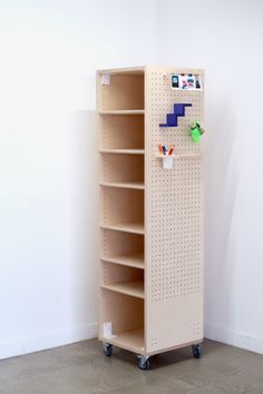 a tall shelf with several shelves on each side