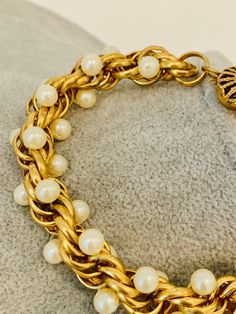 "Vintage gold tone twisted chain link bracelet with faux pearls. The bracelet has a beautiful and unique clasp. It measures 8.5\"." Formal Adjustable Pearl Chain Bracelet, Gold Pearl Bracelet With Chain, Vintage Gold Metal Pearl Bracelet, Vintage Gold Pearl Bracelets, Vintage Gold Pearl Jubilee Bracelet, Vintage Gold Pearl Bracelet, Green Beaded Bracelets, Twisted Chain, Woodland Hills