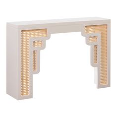 a white console table with laser cut out design on the top and bottom, in front of a white background